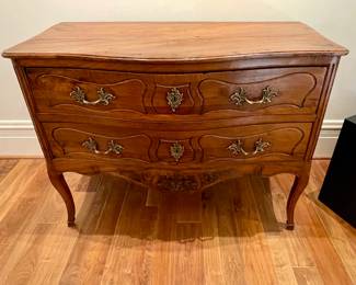 SOLD Alternate view of $3800 Louis XV walnut serpentine two drawer French Provincial chest with pieced apron, intricate hardware and diagonal wood grain of top - 47 x 26 x 35