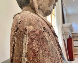 Close up of the side of the sculpture  -$3800-  26 x 14 x 50; antique Chinoiserie wood-carved monumental statue on black metal base