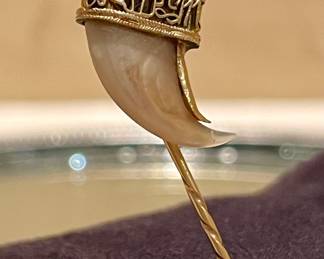 $250 - antique hat pin with authentic animal claw set in gold- (missing stopper)