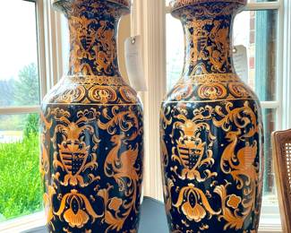 SOLD each (2 available); 9"d x 24"h; hand-painted Chinoiserie urn with black background and red and gold details