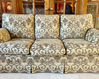 SOLD; 81 x 36 x 35; custom-upholstered, silk brocade, Heraldic Lion motif couch with attached back cushions, rolled arms and pleated skirt; Excellent Condition