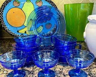 $28; set of 16 blue dishes (3 plates, 3 dessert bowls, 3 coffee cups and saucers, 4 bowls)