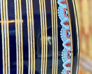 $100; 12"h; hand-adorned, Italian ceramic vase; close-up view of details