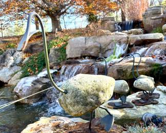 SOLD; set of 4 metal and rock sculptures of momma and three babies (can't find the mark, but looks like Francis Metal Works)