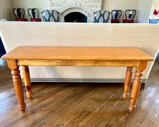 $200; 60 x 17 x 31; pine occasional table with custom skirted cloth and glass top (not shown)