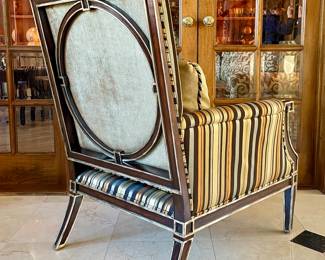 $850 each (2 available); 32 x 35 x 43; John Richard, custom-upholstered arm chair with striped, silk fabric, gilded wood trim, and corded lumbar pillow; view of back of chair
