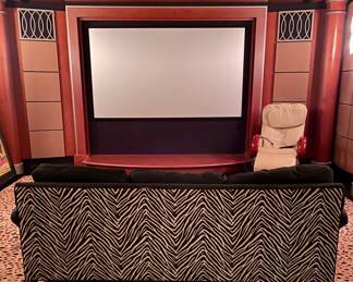 SOLD; 84 x 36 x 38; custom upholstered animal print (back) and black (front) sleeper sofa; you move