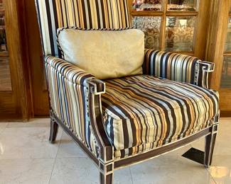 850 each (2 available); 32 x 35 x 43; John Richard, custom-upholstered arm chair with striped, silk fabric, gilded wood trim, and corded lumbar pillow