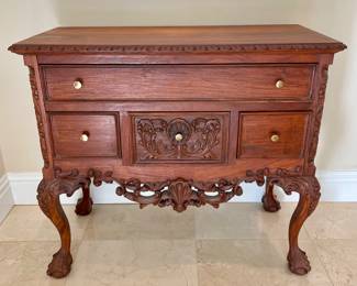 SOLD; 36 x 16 x 32; vintage, carved wood chest with four drawers and talon feet