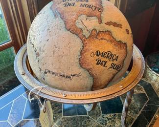 SOLD; 16"d x 20"h; Janice Minor designed and signed natural stone globe with iron stand. HEAVY! 
