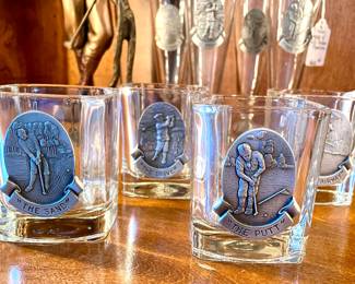 SOLD each set (0 set still available); 3.5"h; set of four rocks glasses with pewter golf medallions