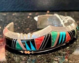 $120; Earl Lee sterling cuff with multi-stone inlay