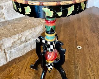 SOLD; 19"d x 28"h; handpainted table; weather damage on top