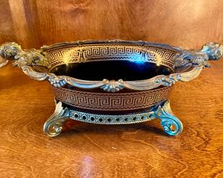 SOLD; 15 x 8 x 6; porcelain bowl with brass edge and feet, Greek keyhole design and goddess head handles
