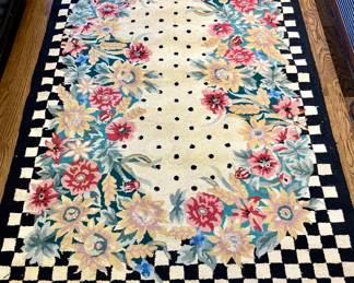 SOLD; 4' x 6' approx; black and white and floral looped rug