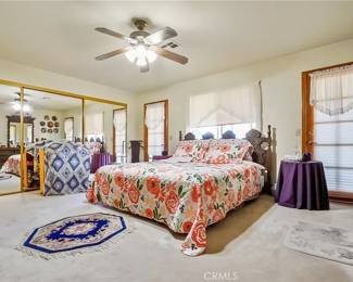 king bed with Spanish headboard, bedroom furniture