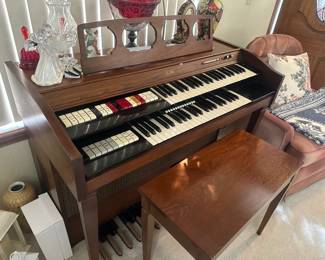 organ with bench and music