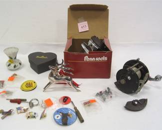 TWO FISHING REELS FOR PARTS, PINS, MINI SCREWDRIVERS, REINDEER CHRISTMAS ORNAMENT AND MORE