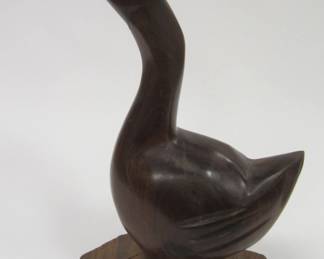 CARVED ROSE WOOD GOOSE. 9" TALL. NATURALLY OCCURING SPLITS