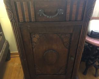 One of a pair of marble top bed stands