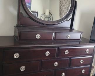 9 Drawer Dresser with Oval Swivel Mirror with 2 Drawers.