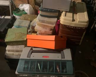 Many tackle boxes with lures 
