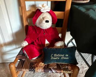 Francesa LaFlame (a Boyds Bear) is sitting on a woven necktie chair. She's fancy like that.