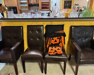 Four Leather Chairs