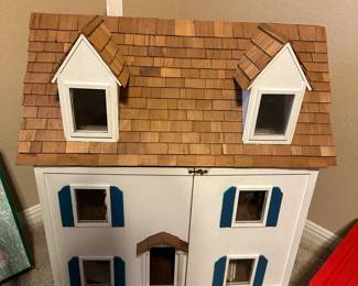 Dollhouse (front panel opens and top roof goes up) with a box of furniture and accessories