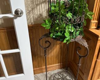 Wrought iron plant stand decor in office