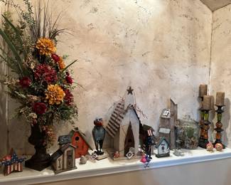 Front entry niche with a birdhouse collection