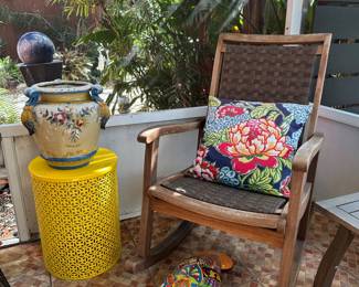 The pot, yellow garden stool, manatee and pillow were sold.