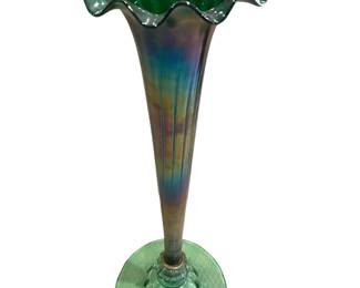 $1000 USD      Very Large Favrile attributed to Tiffany Carnival Glass Tulip Shape Floor Vase JS45-11702    Description : Very Large Favrile attributed to Tiffany Carnival Glass Tulip Shape Floor Vase The vase is wildly attractive iridescent art glass with shades of purples, greens, blues and gold tone. It is a desirably fluted, colorful flower vase. There are ornate fluting blossoms that flourish around the rolled rim.

 

Local pickup Bethesda, MD.  Contact us for shipper suggestions.

Condition Desc. : Excellent. No chips or cracks. Please refer to photos for a more detailed look at condition. We make every attempt to list and photograph any defects or signs of wear that are significant to this sale.
Location : Bethesda, MD     https://goodbyhello.com/products/very-large-favrile-attributed-to-tiffany-carnival-glass-tulip-shape-floor-vase-js45-11702?_pos=13&_sid=3e691755c&_ss=r