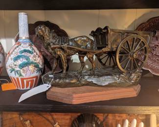 Bronze statue of Dog Pulling Cart