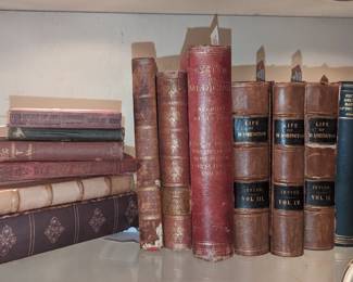Assortment of antique leather bound books 