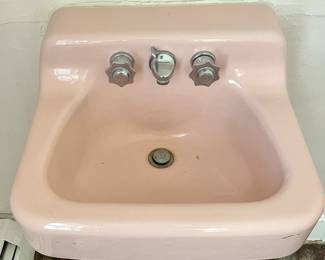 american standard vintage pink wall mounted sink with original faucet and knobs 
