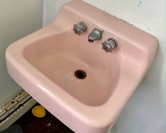 american standard vintage pink wall mounted sink with original faucet and knobs 