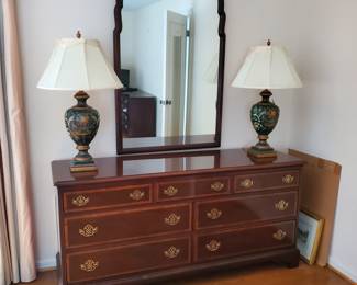 Dresser and mirror with 2 matching nightstands. One nightstand has some sun fading. Dresser is 66.5"W x 32"H. Nightstands are 22.5"w x 26.5"h x 16"d.
$275
