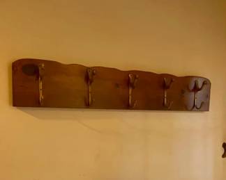Cool coat rack with brass hooks
