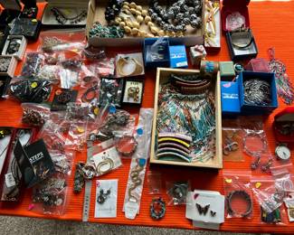 Large table filled with jewelry. No gold or sterling.
