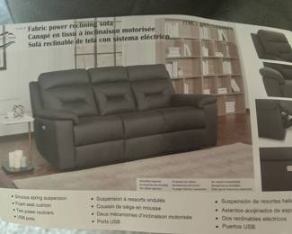 7 ft. sofa with reclining seats on both sides. Priced at $350. Original price was $850. Rarely sat on.