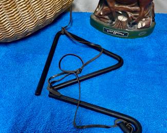 Cast Iron Chuckwagon Dinner Bell with Leather hanging attachments (outdoor or indoor use) and an Ezra Brooks Moose Liquor Decanter (empty)