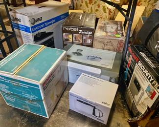RIVAL Ice Cream Maker, Electric Typewriter, Large Stainless Roaster, Metal Security File and so much more in orig boxes...like brand new! 