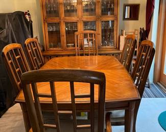 Large China Cabinet, table, two leaves, 6 chairs. It also has a matching small cabinet. All are sold separately.