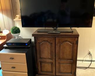 Cabinet opens up to a bar.