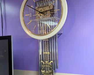 Mid-century HOWARD MILLER Focal Lucite Chrome Pendulum Clock