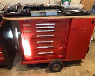 Kennedy 14 Drawer Tool Chest and Cart with Custom Attached Wooden Work Top.  Wooden Work Top Surface Measures 47in x 22in. 13 Drawer cabinet without cart measures 41in W  x 27.5in H x  20.5in D. Cart is approx. 43.25in W x 20.5in D,