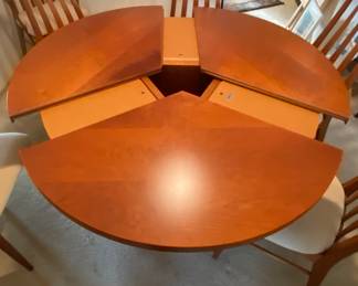 SKOVBY #33 DINING TABLE
Patented round Skovby #33 dining table with 3 folding leaves stored in base
The dining table can be extended from four to six seats comfortably.&nbsp;
48" - 58" D x 29" H
made in Denmark &nbsp;