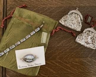 Russian porcelain brooch. Chain mail pouches