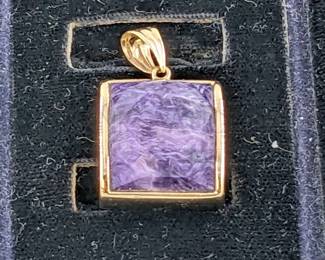 6.56 GRAMS TW 14K GOLD PENDANT W/ PURPLE STONE 1.25"